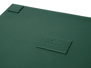 Green watch tray rear view with embossed brand logo by Carapaz